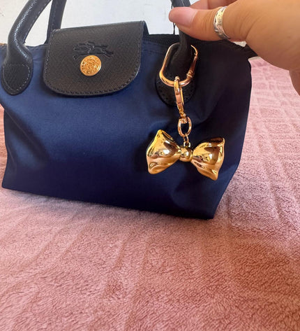 Handbag accessory - gold bow