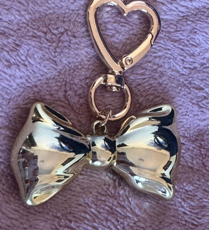Handbag accessory - gold bow